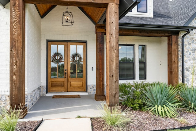 property entrance featuring french doors