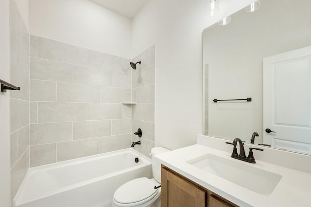 full bathroom with vanity, toilet, and tiled shower / bath