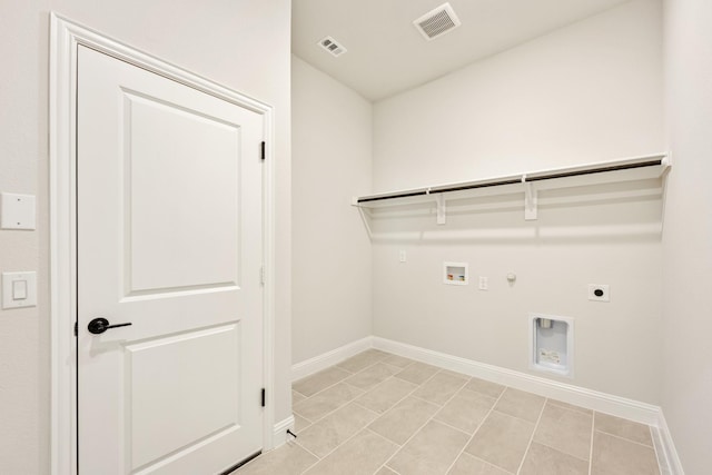 laundry room featuring electric dryer hookup, washer hookup, hookup for a gas dryer, and light tile patterned floors