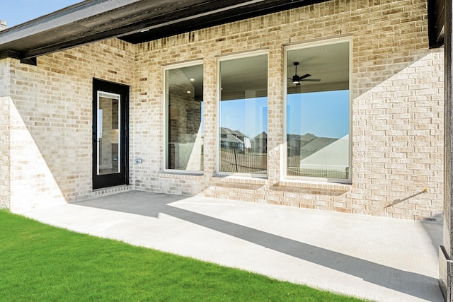 doorway to property featuring a patio area