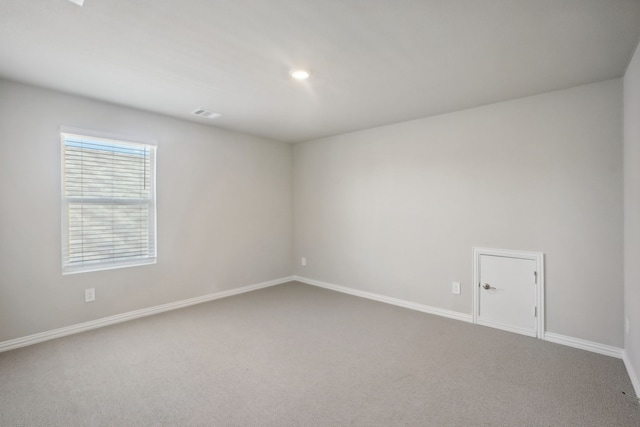 unfurnished room with carpet floors