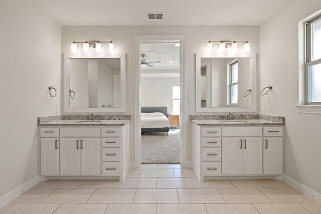 bathroom featuring vanity, plenty of natural light, and ceiling fan