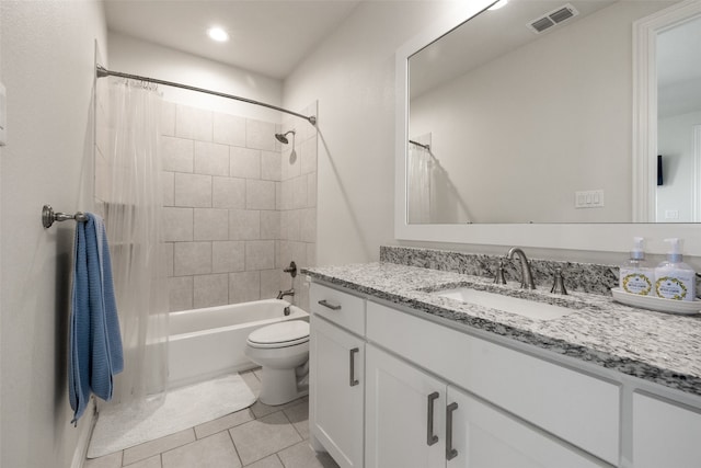 full bathroom with vanity, toilet, shower / bath combination with curtain, and tile patterned flooring