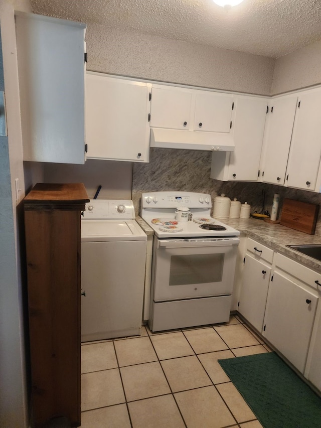 kitchen featuring white cabinets, washer / clothes dryer, and white range with electric cooktop