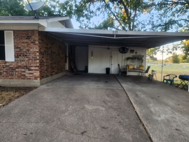 exterior space with a carport