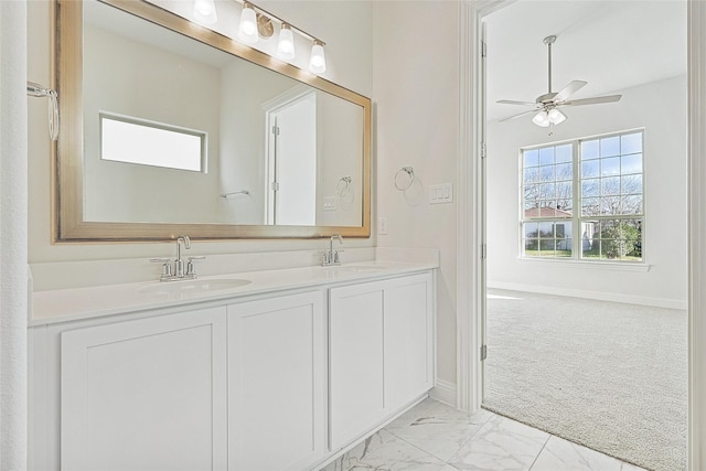 bathroom featuring vanity and ceiling fan