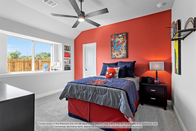 bedroom with vaulted ceiling, ceiling fan, and light colored carpet