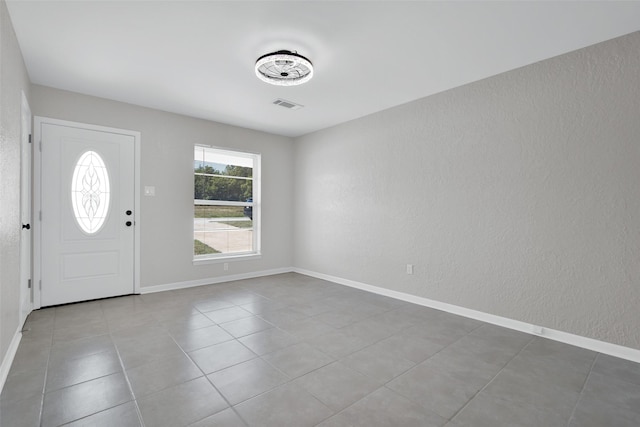 view of tiled foyer entrance