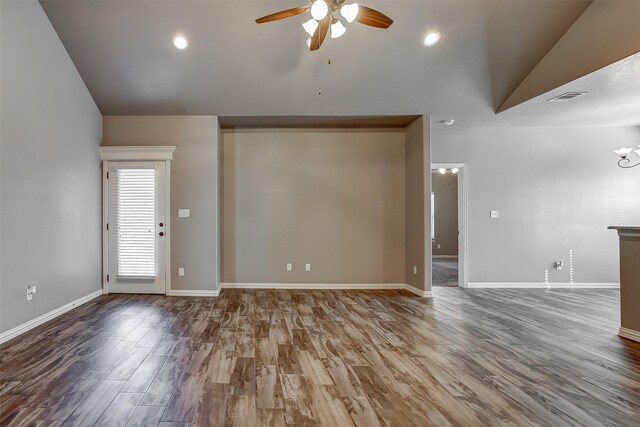 interior space with hardwood / wood-style floors, ceiling fan, and high vaulted ceiling