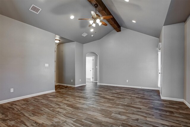 empty room featuring ceiling fan, beamed ceiling, dark wood-type flooring, and high vaulted ceiling