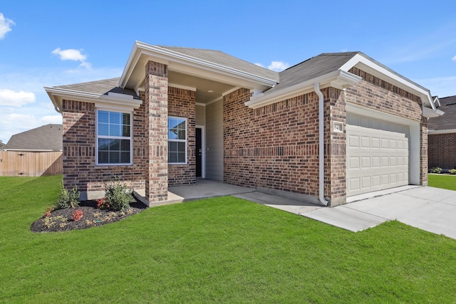 ranch-style home with brick siding, an attached garage, fence, driveway, and a front lawn