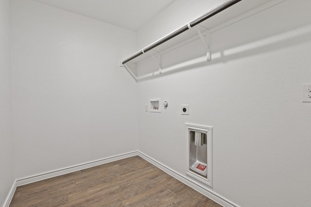 laundry area with washer hookup, electric dryer hookup, wood finished floors, laundry area, and baseboards