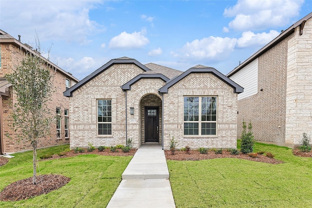 view of front of house with a front yard