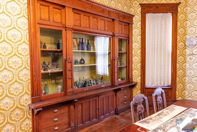 dining area with dark wood-type flooring