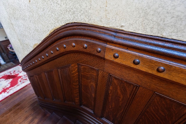 interior details featuring hardwood / wood-style flooring