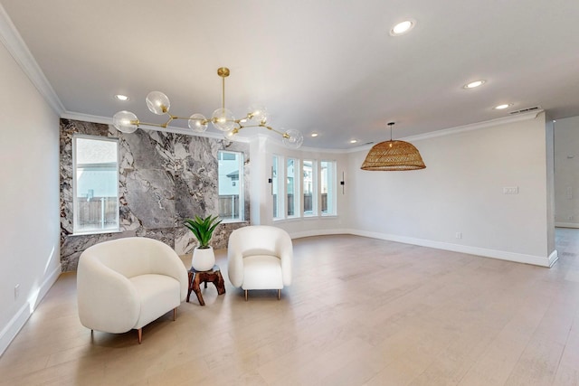 sitting room featuring a notable chandelier, ornamental molding, light hardwood / wood-style flooring, and plenty of natural light