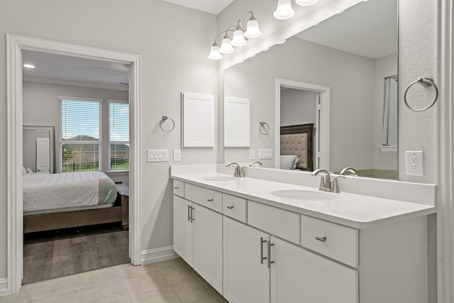 bathroom with vanity and tile patterned floors