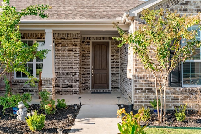 doorway to property with covered porch