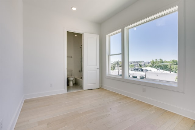 empty room with light wood-type flooring