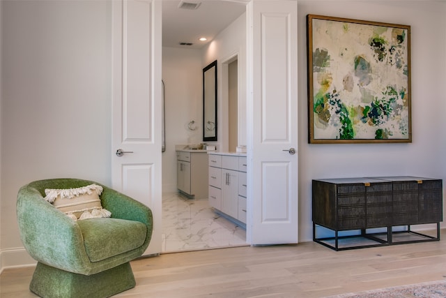 living area featuring light wood-type flooring