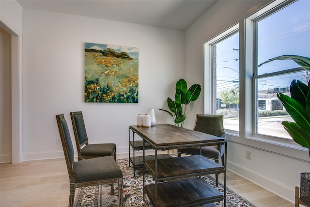 office with light hardwood / wood-style floors