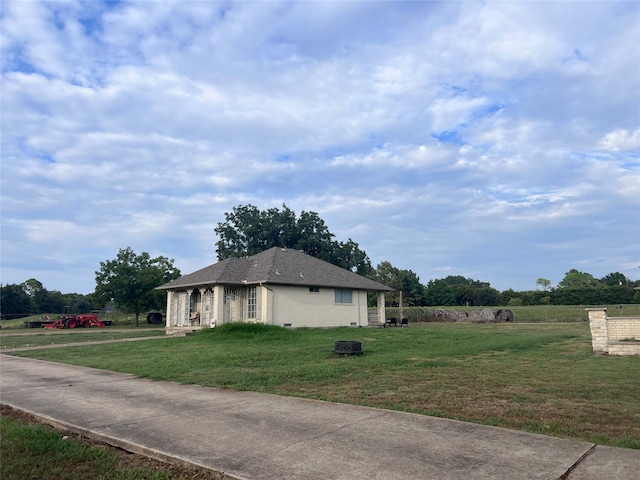 ranch-style house with a front lawn