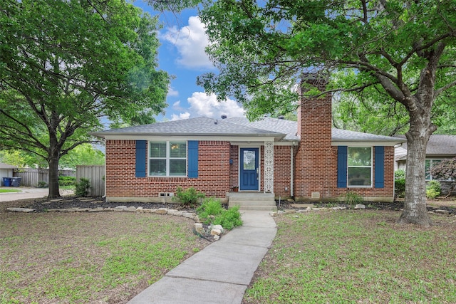 view of front of home with a front lawn