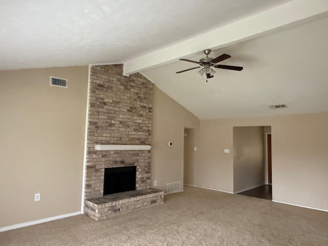 unfurnished living room featuring carpet flooring, vaulted ceiling with beams, ceiling fan, and a brick fireplace