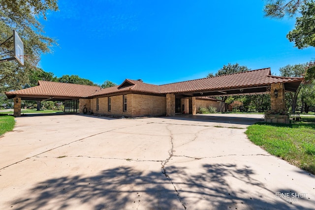 view of front of property with a carport