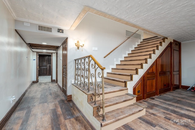 stairway featuring hardwood / wood-style flooring