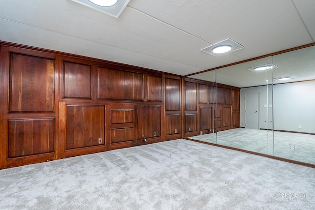 basement with carpet flooring