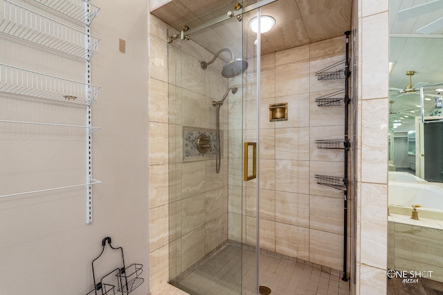 bathroom with a shower with shower door