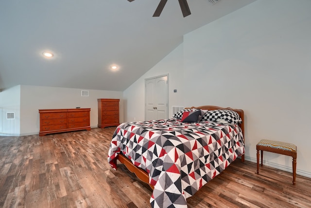 bedroom with vaulted ceiling, dark hardwood / wood-style floors, and ceiling fan