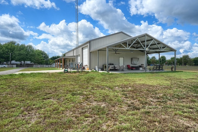 exterior space featuring ceiling fan and a patio area