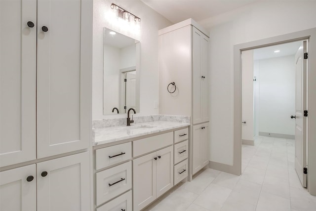 bathroom featuring vanity and tile patterned floors