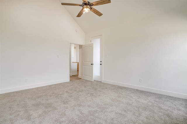 unfurnished room with light carpet, high vaulted ceiling, a ceiling fan, and baseboards