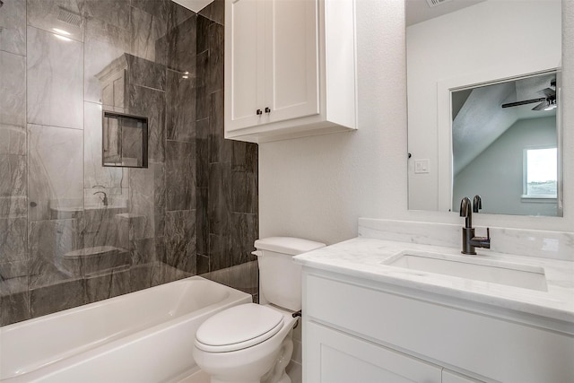 bathroom with a ceiling fan, shower / washtub combination, vanity, and toilet