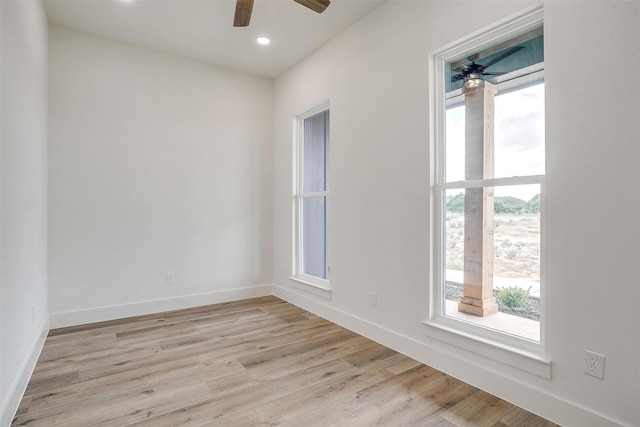 unfurnished room with light wood finished floors, ceiling fan, baseboards, and recessed lighting