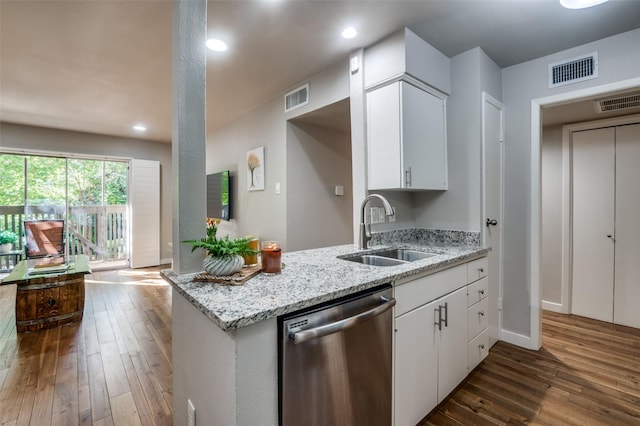 kitchen featuring dishwasher, sink, white cabinets, light stone countertops, and dark wood-type flooring