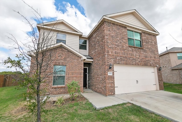 view of front property with a front lawn and a garage