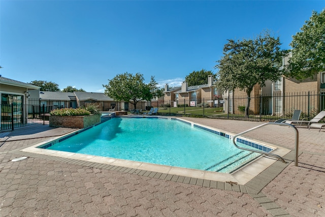 view of pool with a patio area