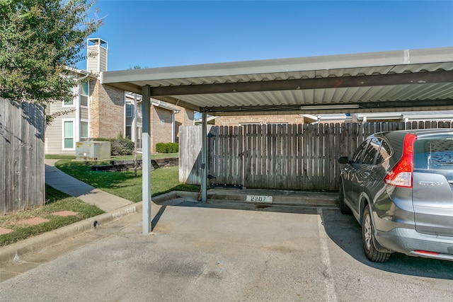 view of parking with a carport