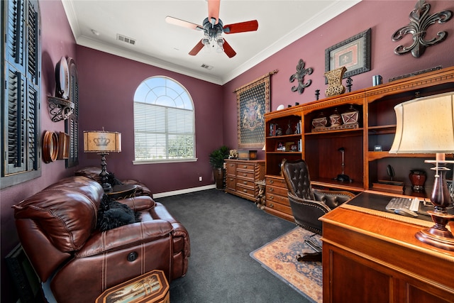 office space with ceiling fan, dark carpet, and ornamental molding