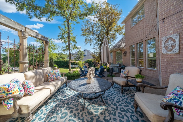 view of patio featuring outdoor lounge area and grilling area