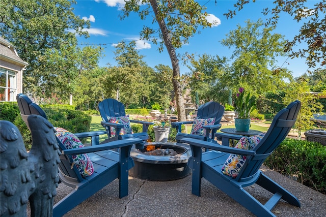 view of patio featuring an outdoor fire pit