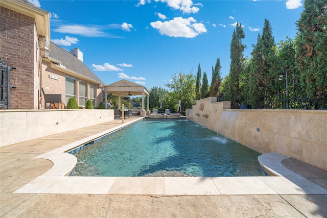 view of pool featuring a patio area and pool water feature