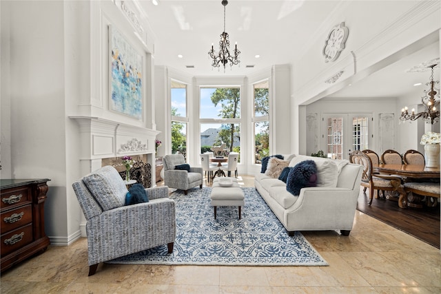 living room with french doors, crown molding, a high ceiling, and an inviting chandelier