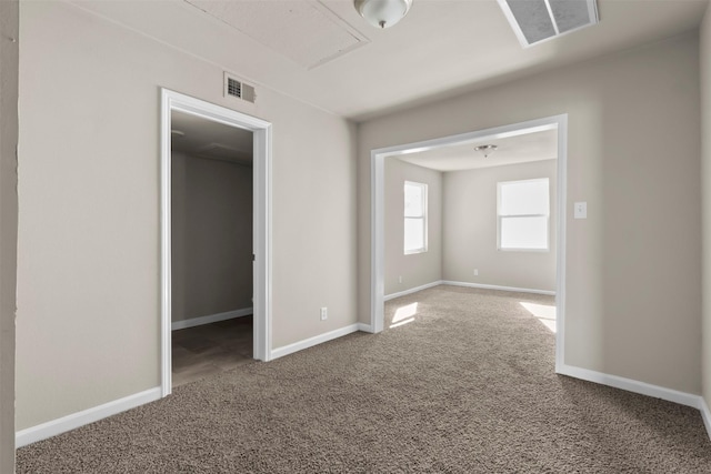 spare room with carpet flooring