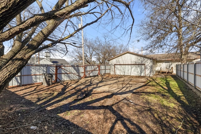 view of yard featuring a garage