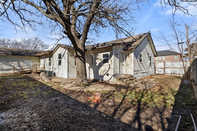 back of house with a patio and central air condition unit